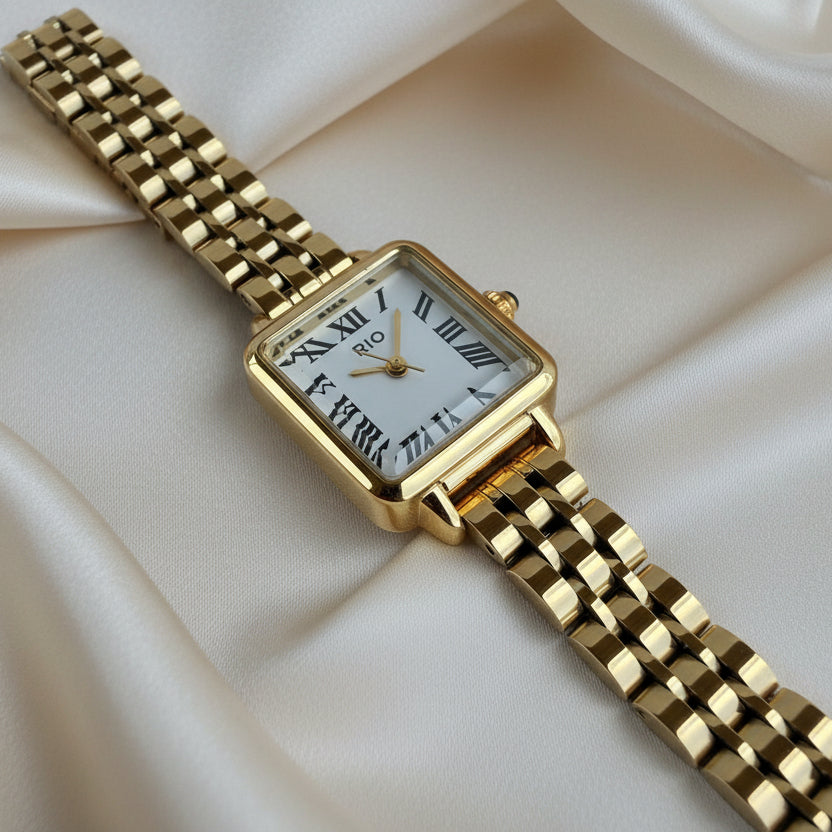 Reloj cuadrado dorado nùmeros romanos