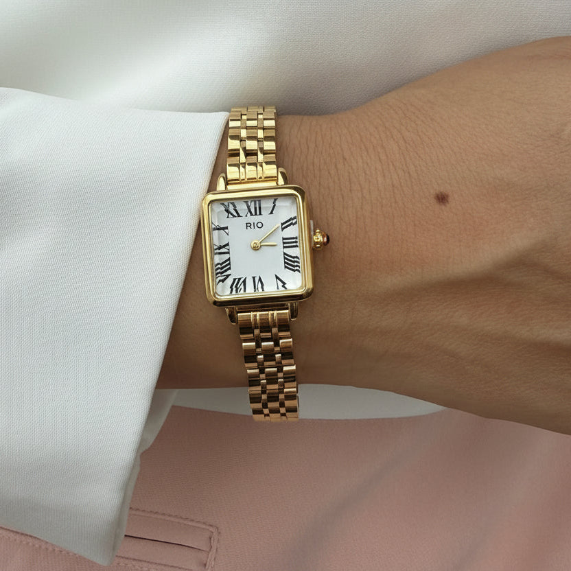 Reloj cuadrado dorado nùmeros romanos