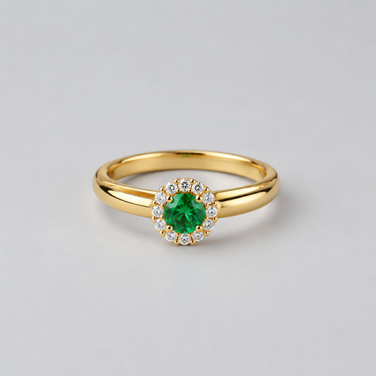 ANILLO REDONDO PIEDRA VERDE BORDE CIRCON